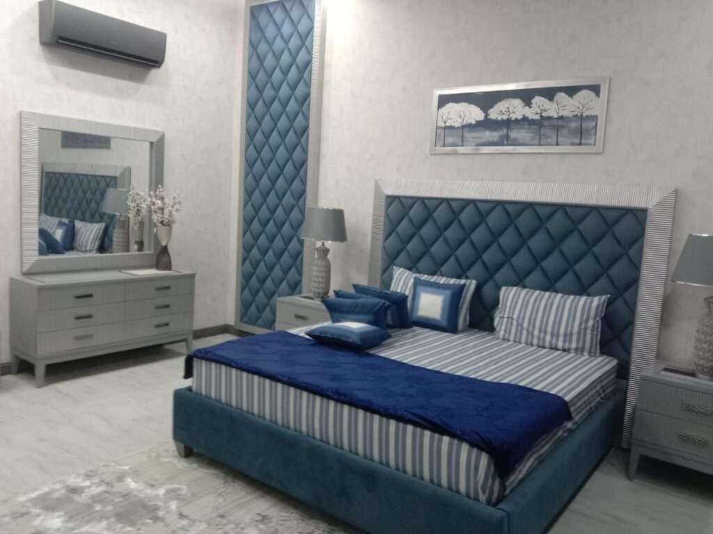 Modern Pakistani living room furniture 2025 – sustainable sofa set with wooden center table